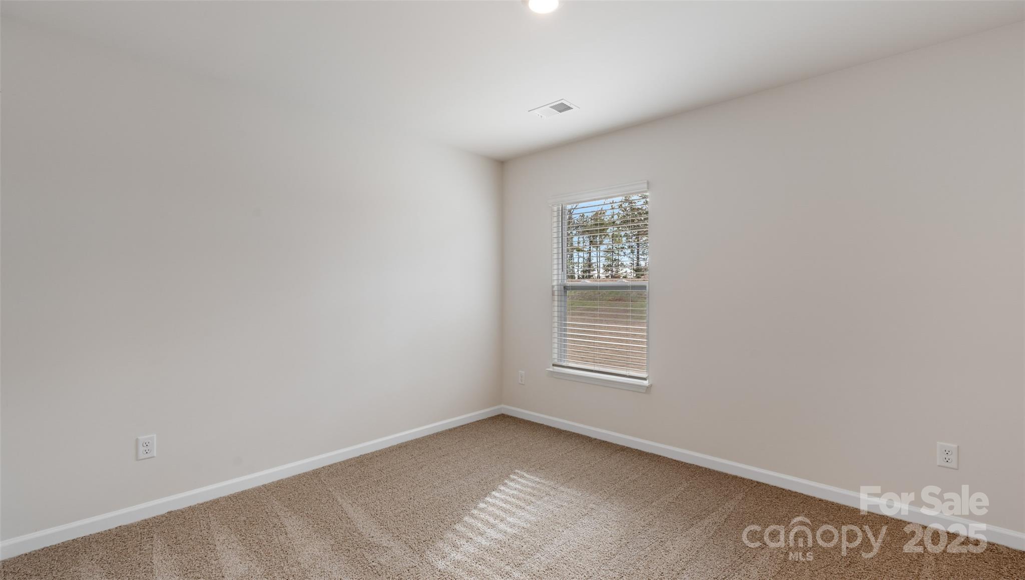 172 Callie River Clyde, NC 28721 - Photo 10 of 21 a view of an empty room with a window