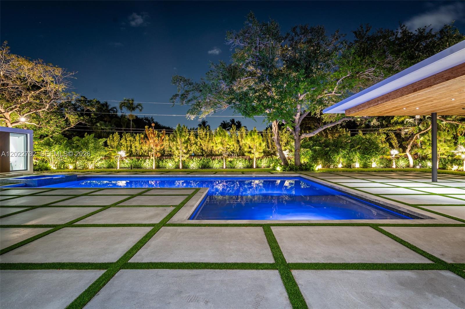 7825 Southwest 128th Street Pinecrest, FL 33156 - Photo 81 of 88 a view of a tennis court