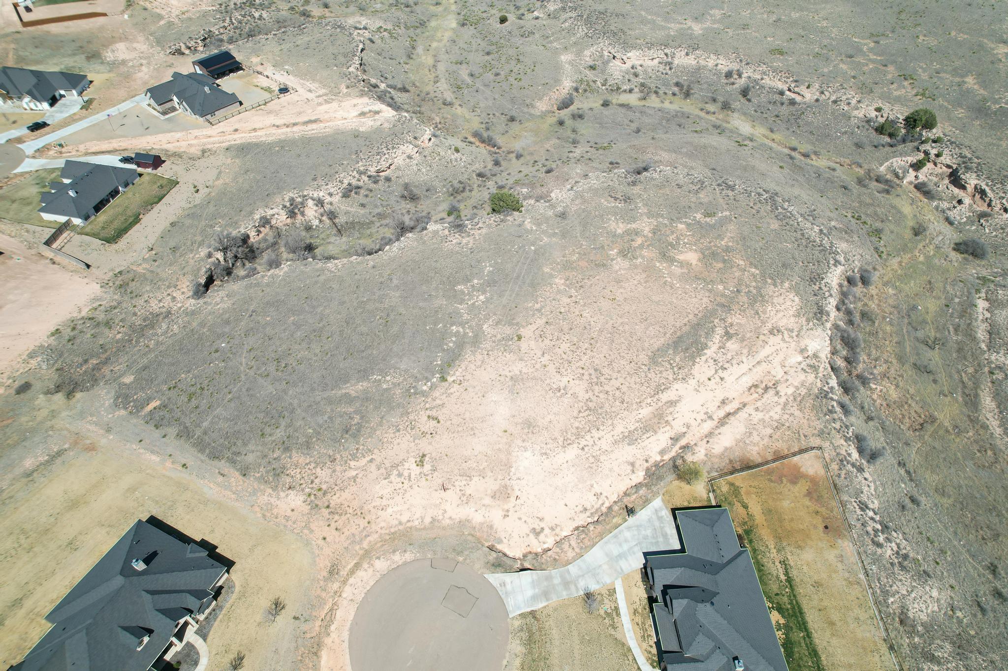 19250 Sisters Way Amarillo, TX 79124 - Photo 4 of 9 a view of open space with wooden floor