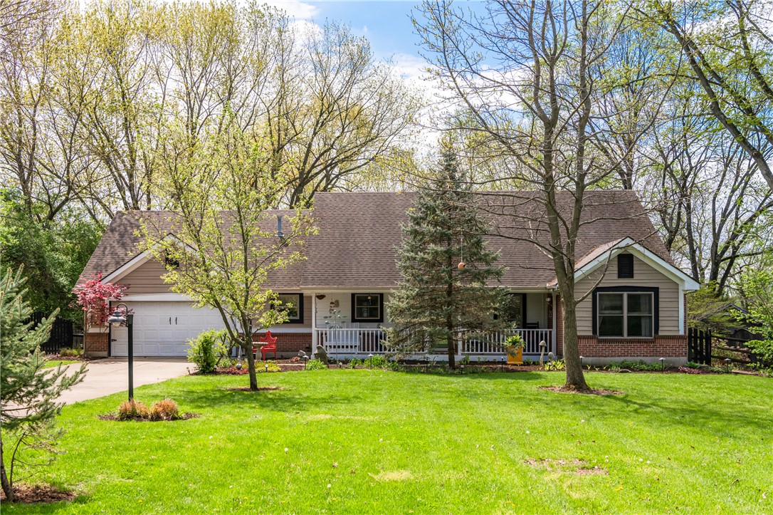 159 East Lytle 5 Points Road Springboro, OH 45066 - Photo 1 of 45 This charming home offers a welcoming facade with a lush, manicured lawn and mature trees.