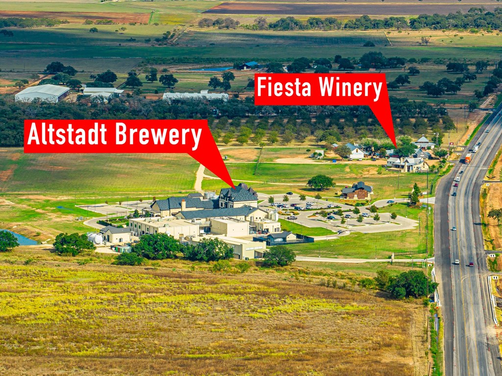 85 Arch Ray Loop, Unit 85 Fredericksburg, TX 78624 - Photo 4 of 12 a sign that is on a city street