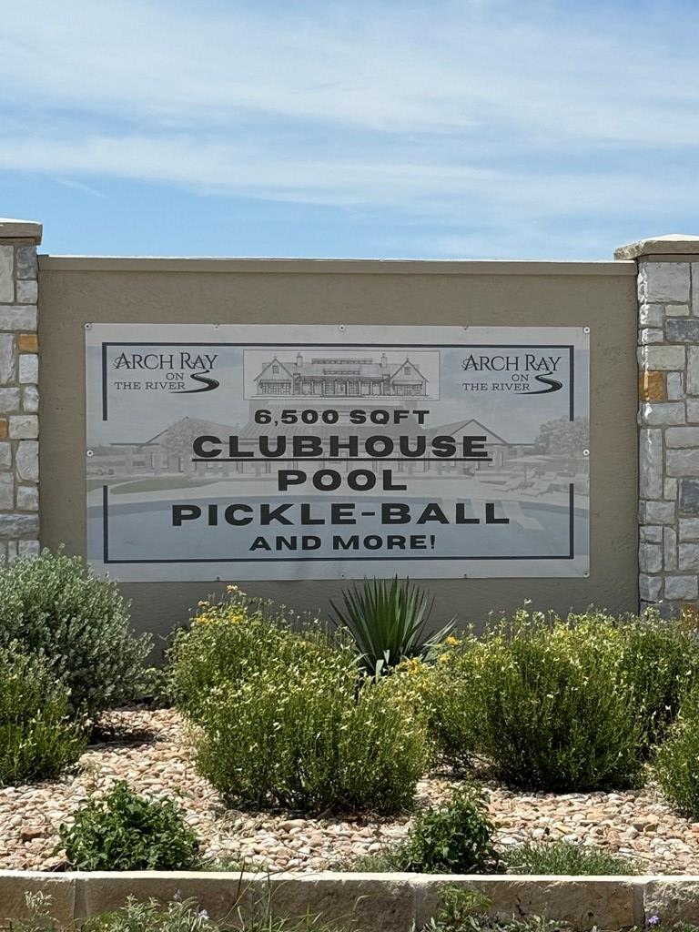 85 Arch Ray Loop, Unit 85 Fredericksburg, TX 78624 - Photo 10 of 12 a view of a sign board