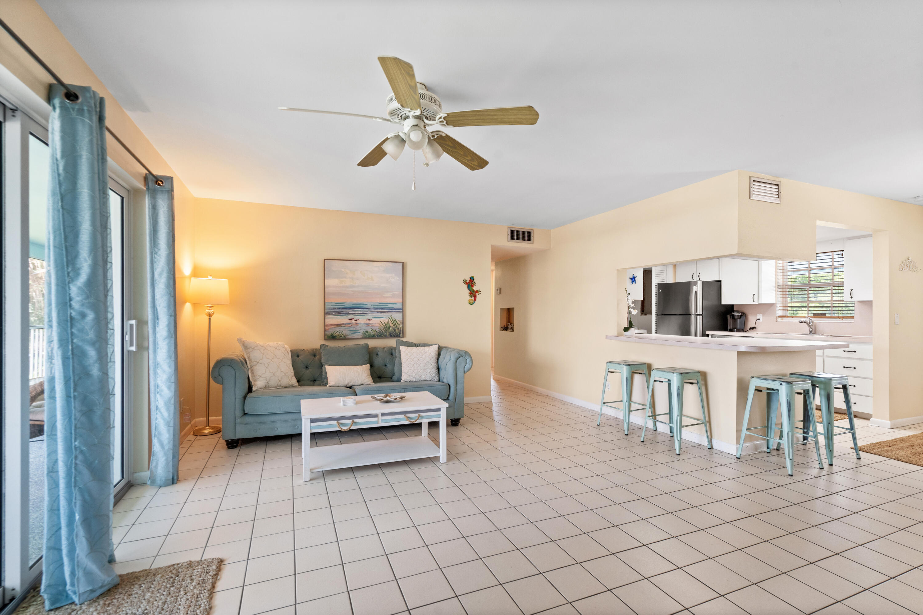249 Center Street, Unit 2C Jupiter, FL 33458 - Photo 13 of 29 a living room with furniture