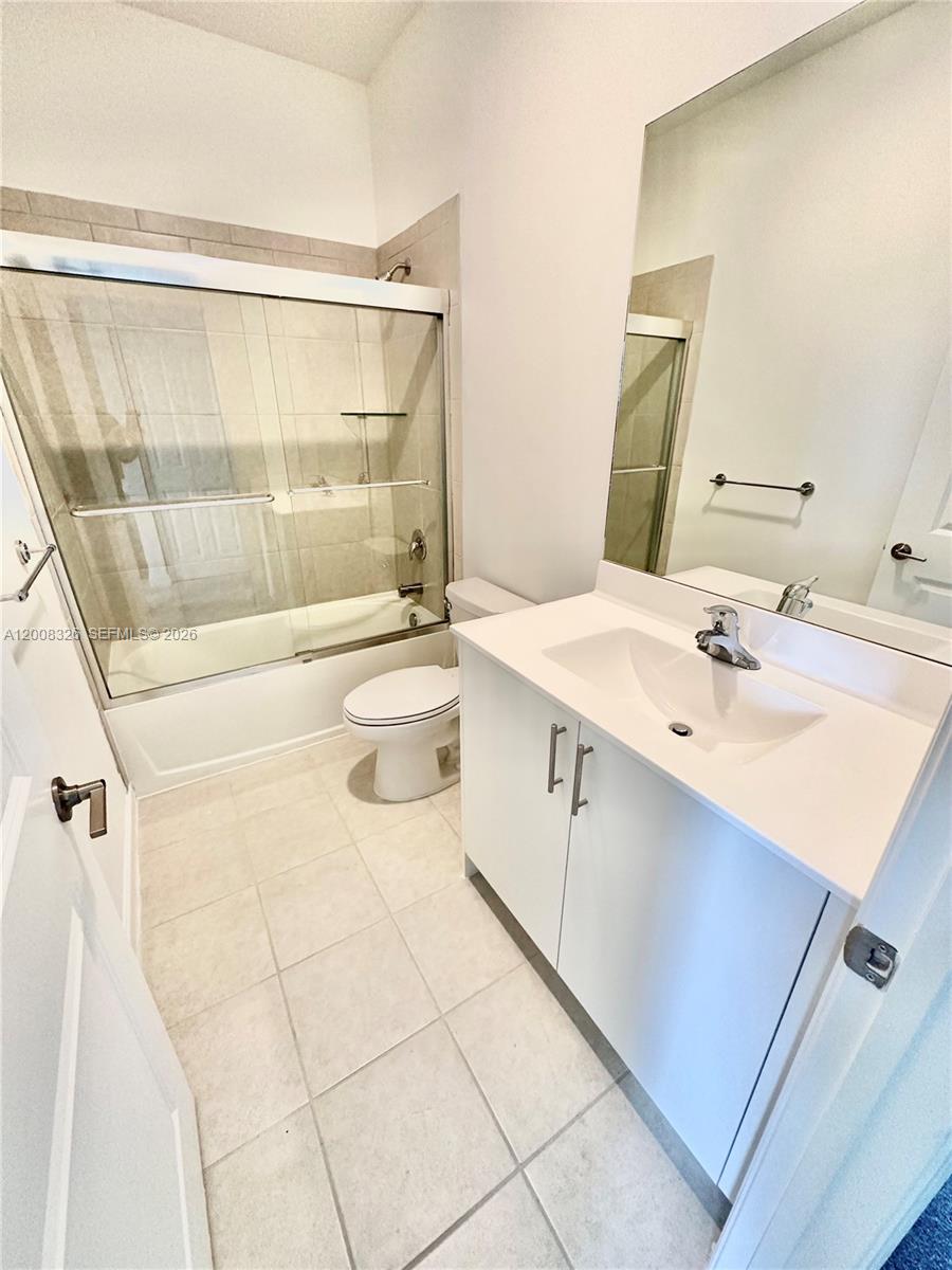 261 Southwest 159th Way Pembroke Pines, FL 33027 - Photo 11 of 17 a bathroom with a sink a toilet and shower