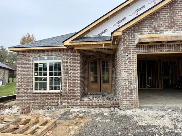 a front view of a building with glass windows