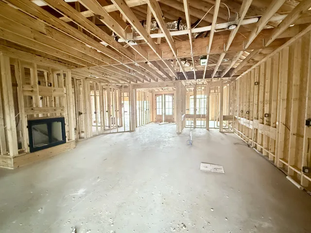 a view of a room with wooden walls