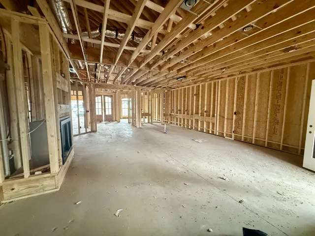 a view of a room with wooden walls