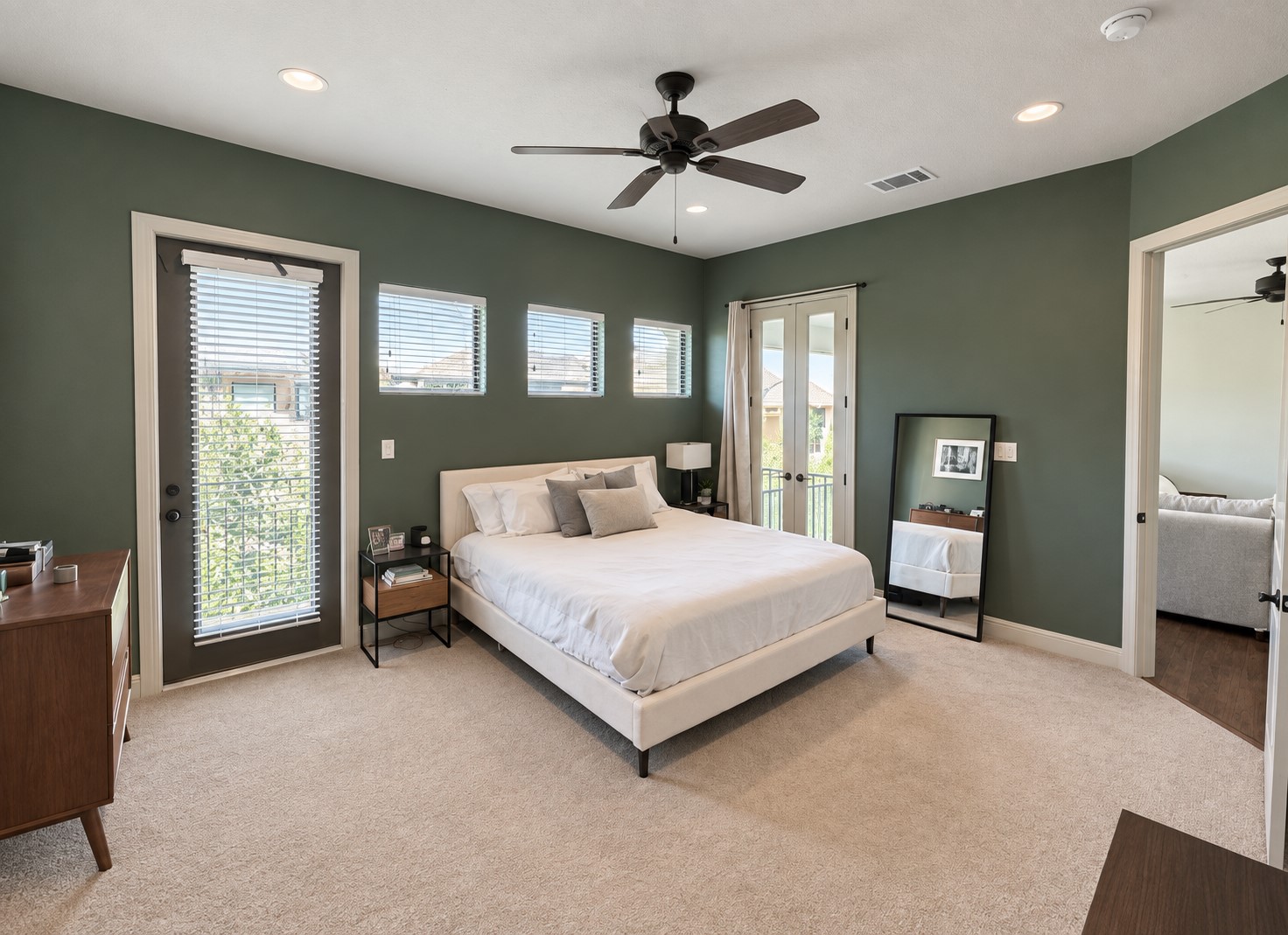 2316 Thornton Road, Unit B Austin, TX 78704 - Photo 15 of 25 Richly toned walls and plush carpeting create a serene and inviting atmosphere in this bedroom.