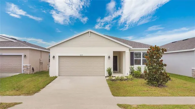 a front view of house with yard