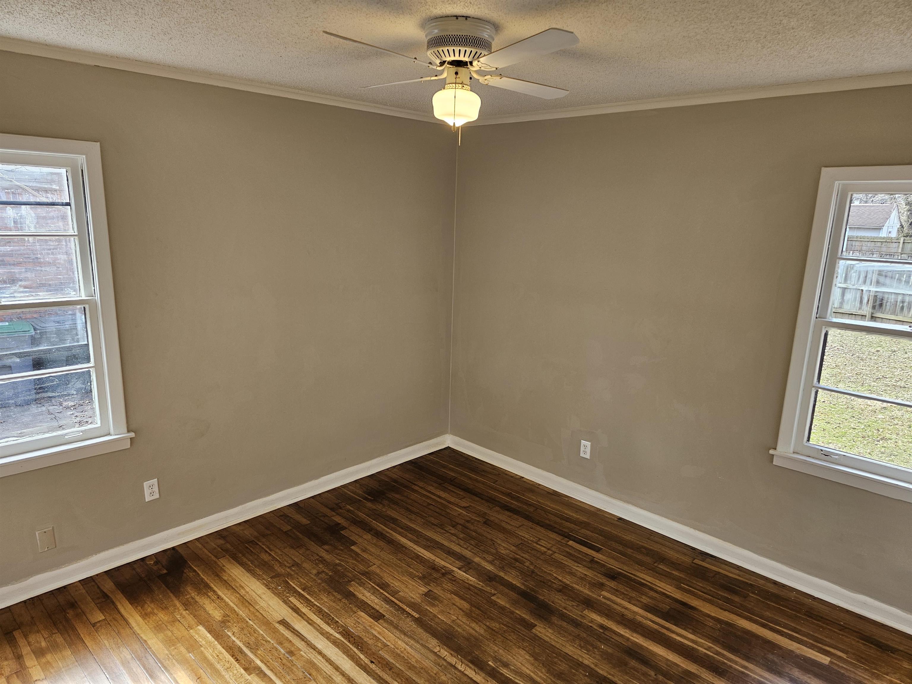 1485 Ivy Road Memphis, TN 38117 - Photo 5 of 22 a view of empty room with windows