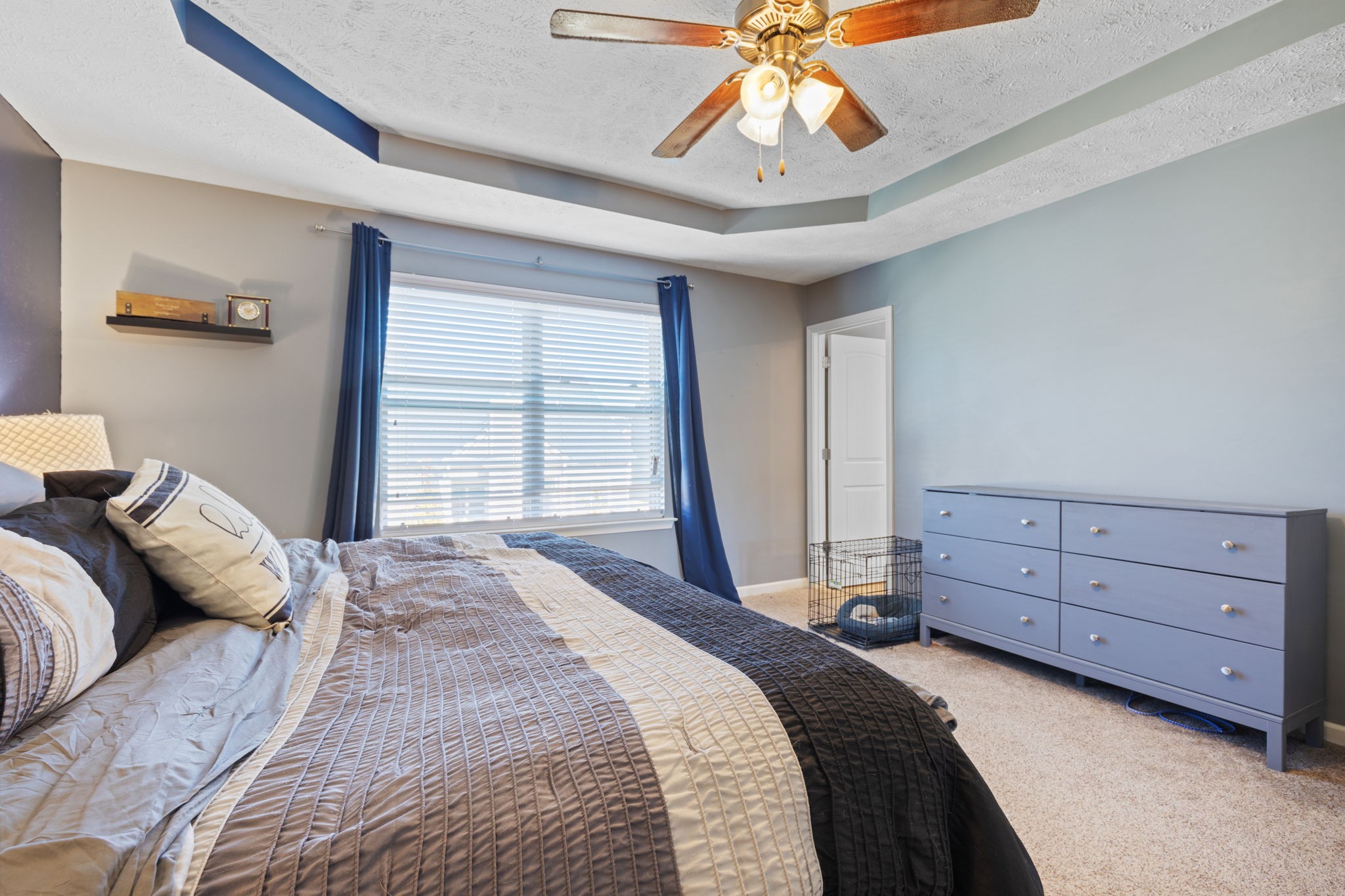 4406 Prometheus Way Murfreesboro, TN 37128 - Photo 13 of 27 a bedroom with a bed and a chandelier