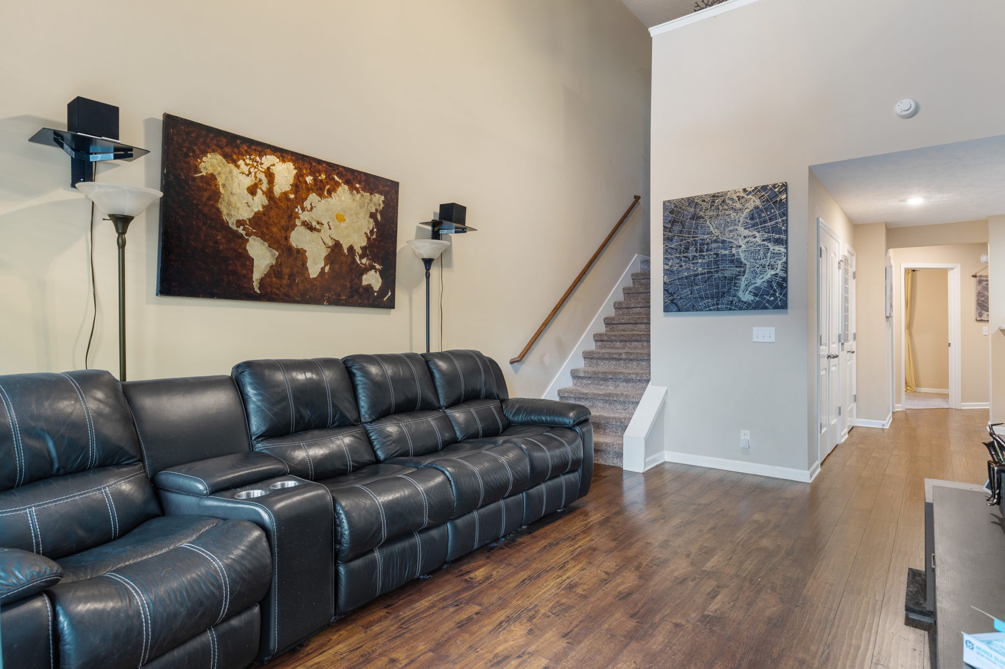 4406 Prometheus Way Murfreesboro, TN 37128 - Photo 3 of 27 a blue couch sitting next to a blue wall with a large window
