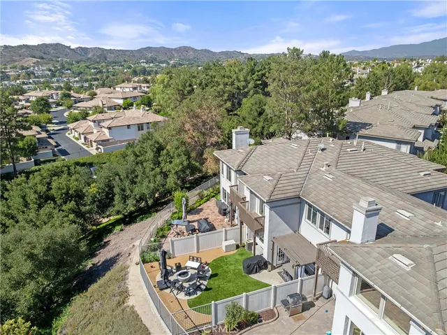 an aerial view of a house with a garden