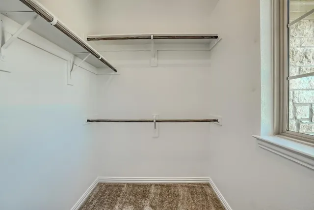 a view of a room with racks on the wall