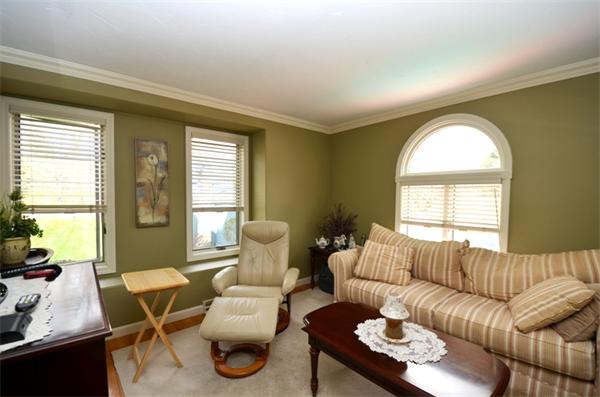 150 Dunstable Road Chelmsford, MA 01863 - Photo 20 of 30 a living room with furniture and a large window
