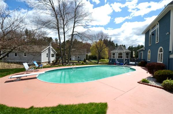 150 Dunstable Road Chelmsford, MA 01863 - Photo 28 of 30 a view of outdoor space yard swimming pool and green space