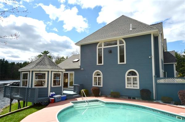 150 Dunstable Road Chelmsford, MA 01863 - Photo 29 of 30 a front view of house with yard outdoor seating and barbeque oven