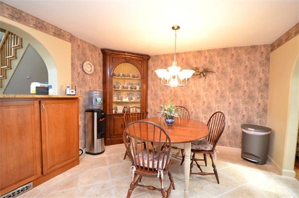 150 Dunstable Road Chelmsford, MA 01863 - Photo 4 of 30 a view of a dining room with furniture window and outside view