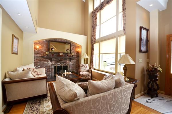 150 Dunstable Road Chelmsford, MA 01863 - Photo 7 of 30 a living room with furniture fireplace and a large window