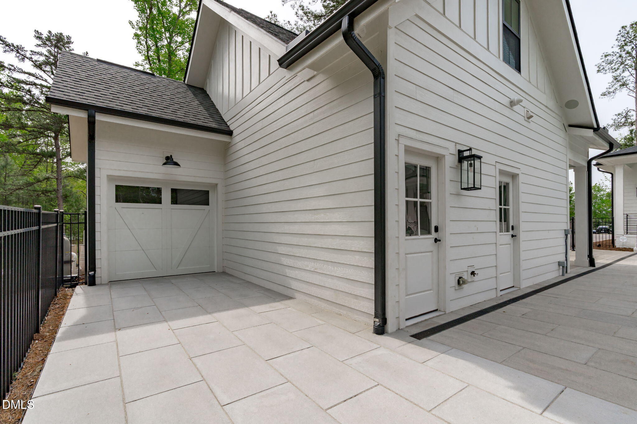 5005 Ten-Ten Road Apex, NC 27539 - Photo 41 of 60 Doors to additional storage area off pool deck, staircase to bonus room over garage, and full bath.