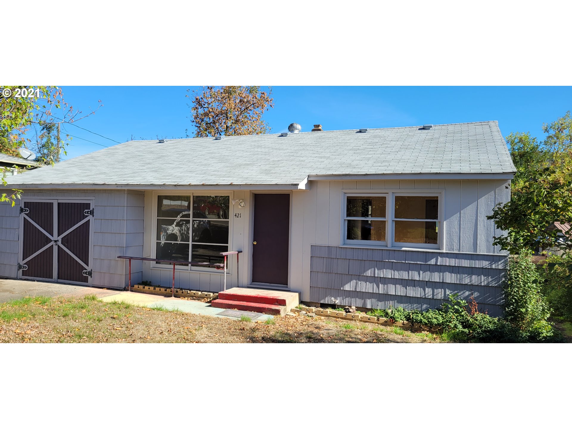 421 Smith Street Riddle, OR 97469 - Photo 2 of 14 a view of house with outdoor space