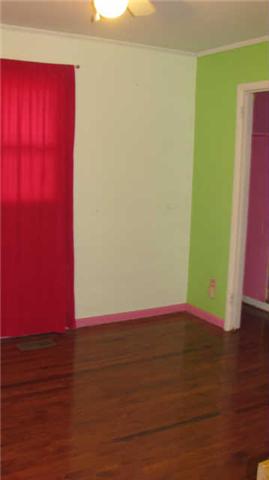 2251 Mansford Road Winchester, TN 37398 - Photo 11 of 18 2nd bedroom offers hardwood, ceiling fan, and 2 closets.