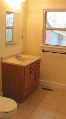 2251 Mansford Road Winchester, TN 37398 - Photo 14 of 18 Guest bath offers tile, tub/shower combo, and new vanity.