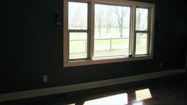 2251 Mansford Road Winchester, TN 37398 - Photo 4 of 18 Large picture window makes this living room very bright and cheerful. Offers great view of the front yard.