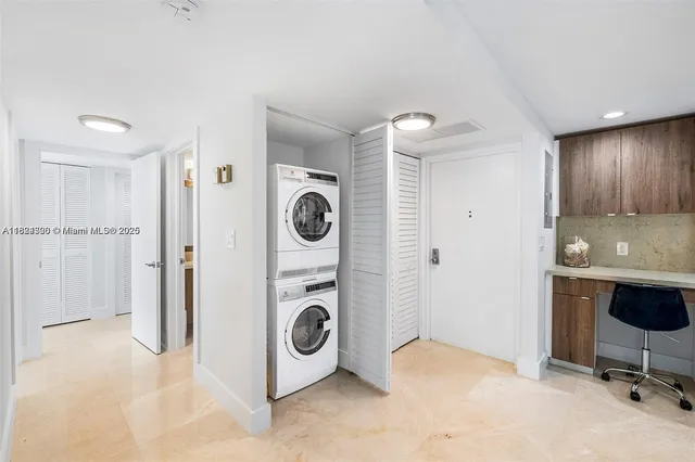 a view of a storage & utility room with washer and dryer