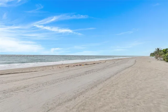 a view of a chairs and table on the terrace