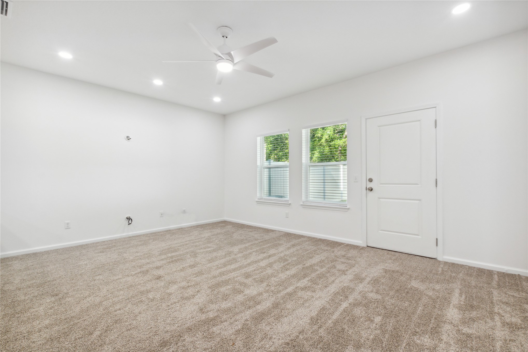 87279 Lents Road Yulee, FL 32097 - Photo 15 of 40 wooden floor in an empty room with a window