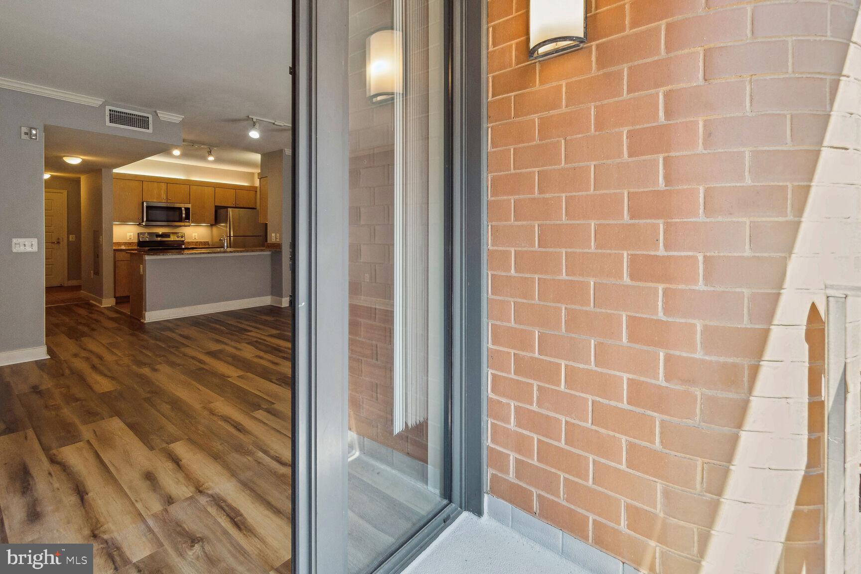 616 E Street Northwest, Unit 807 Washington, DC 20004 - Photo 11 of 24 a bathroom with a glass door shower