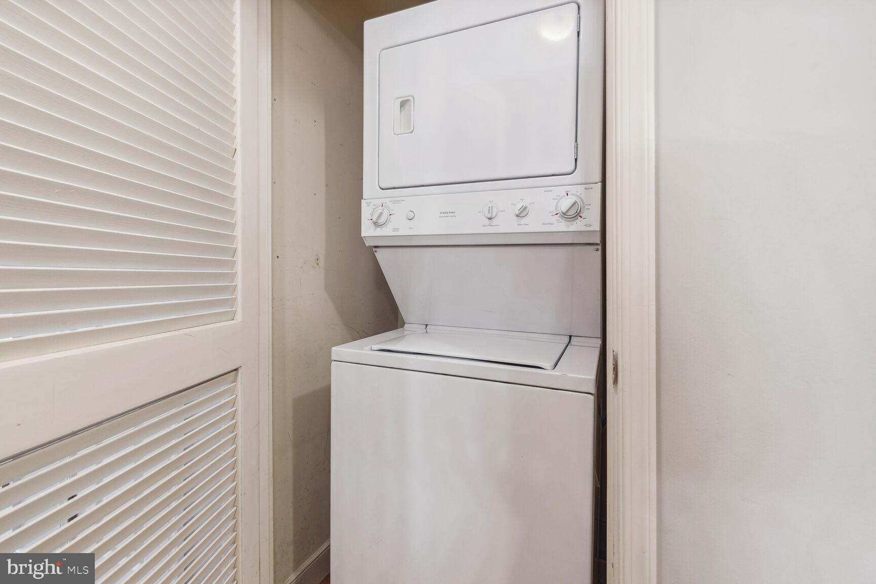 616 E Street Northwest, Unit 807 Washington, DC 20004 - Photo 13 of 24 a close up view of a washer and dryer