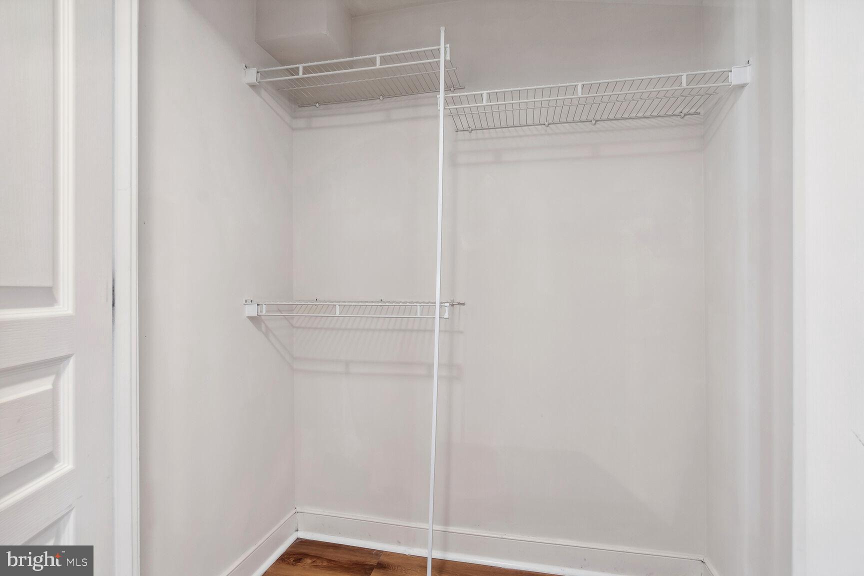 616 E Street Northwest, Unit 807 Washington, DC 20004 - Photo 14 of 24 a bathroom with a glass shower door