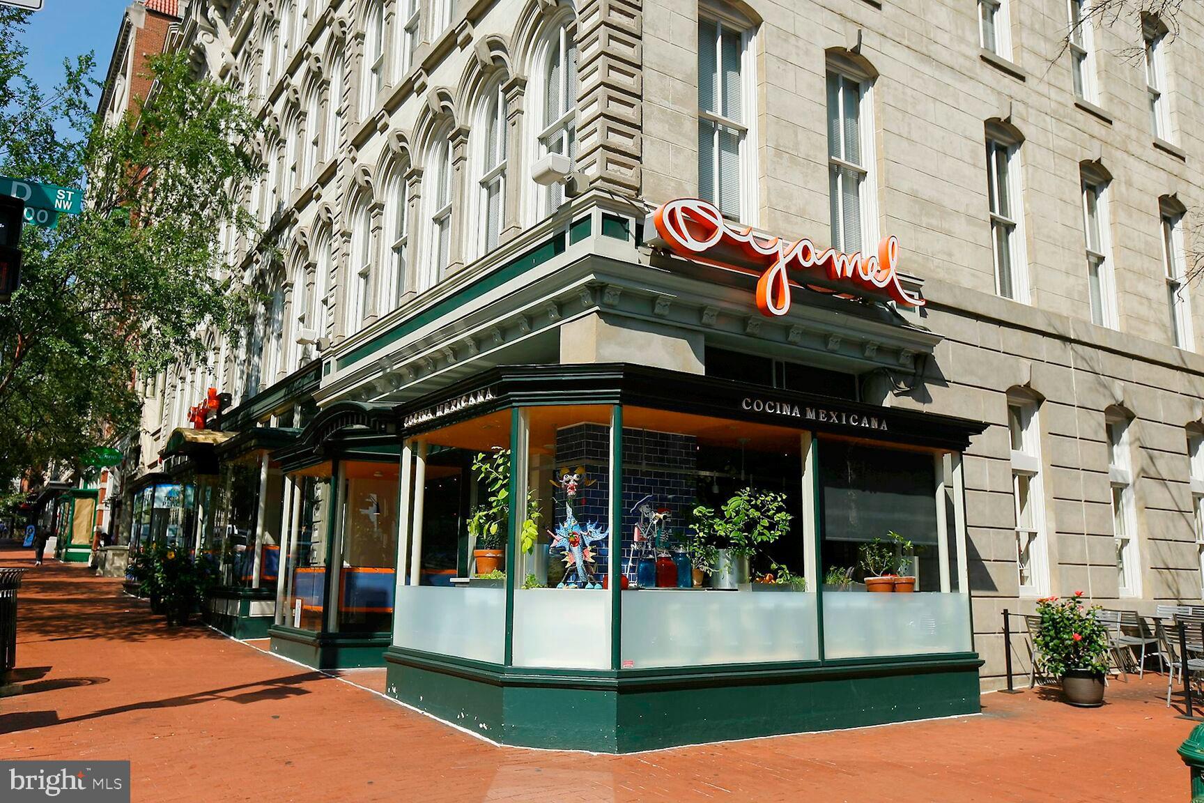 616 E Street Northwest, Unit 807 Washington, DC 20004 - Photo 21 of 24 a view of a brick building with a outdoor space