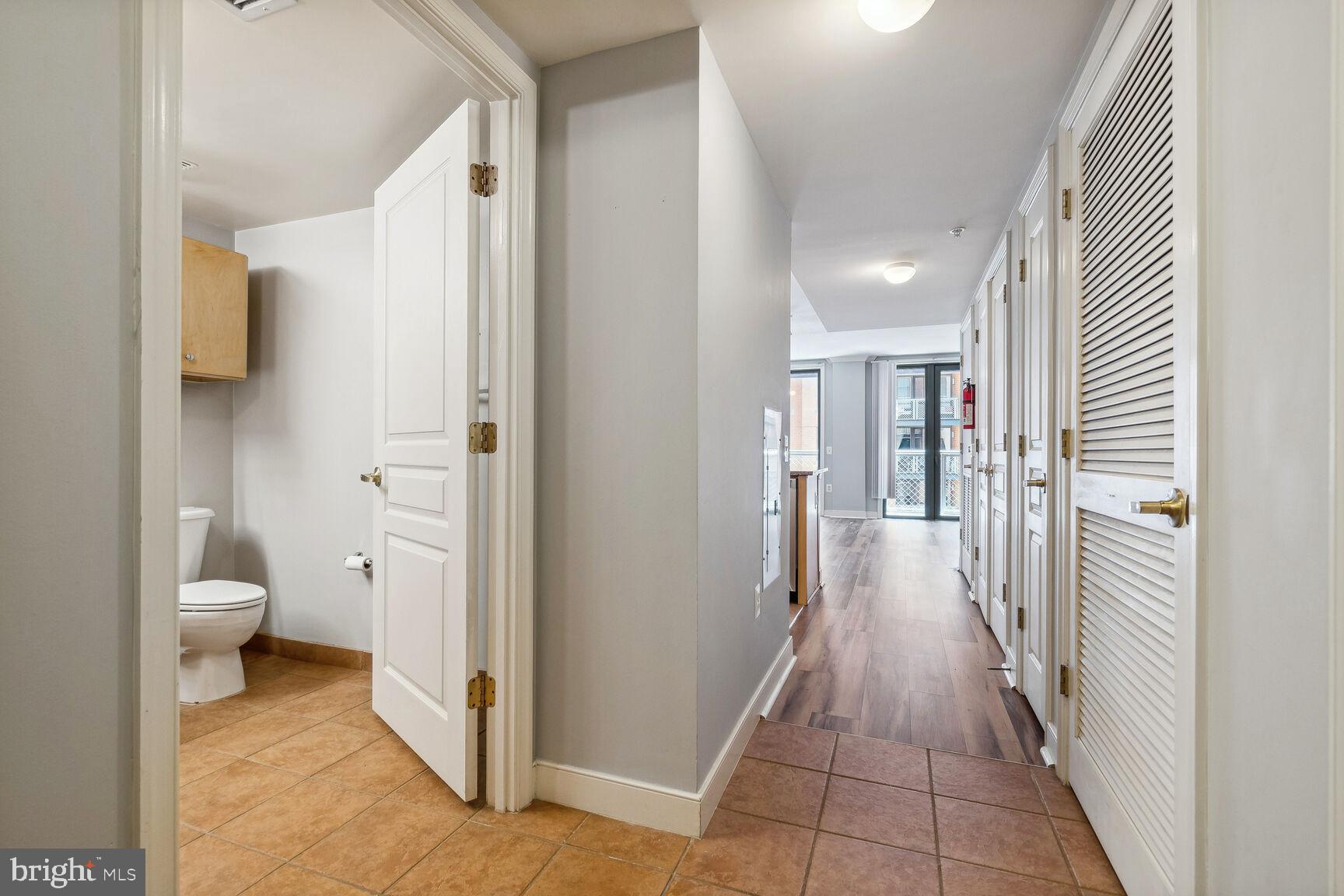 616 E Street Northwest, Unit 807 Washington, DC 20004 - Photo 9 of 24 a bathroom with a toilet and a shower