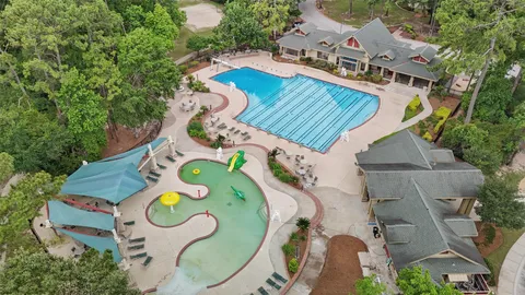 aerial view of a house with a swimming pool