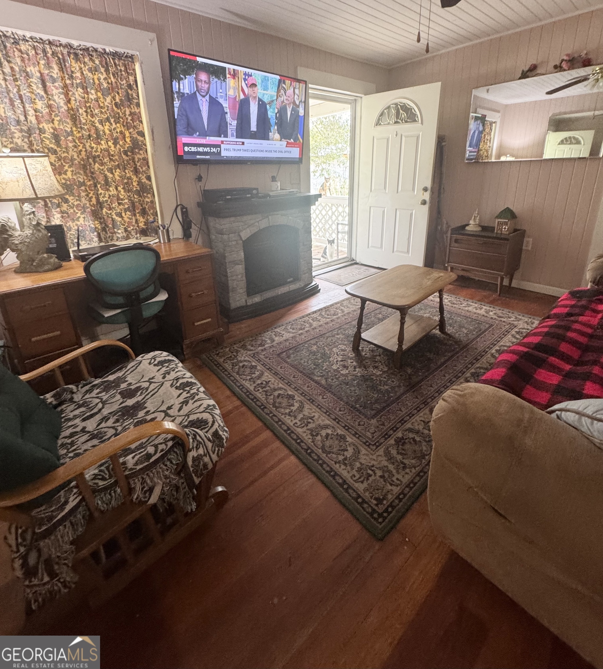 75 Rudolph Road Collins, GA 30421 - Photo 14 of 15 a living room with furniture rug and window