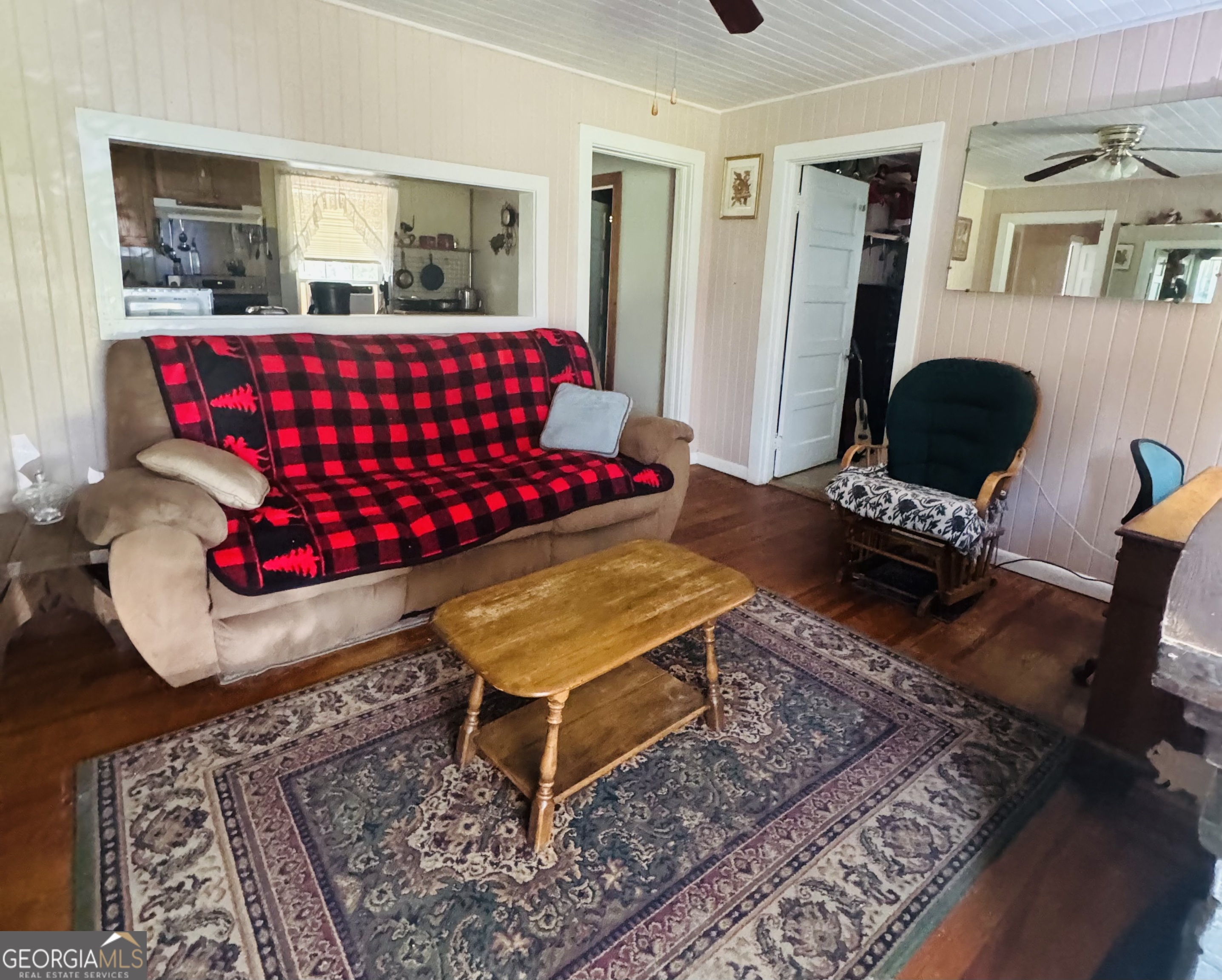 75 Rudolph Road Collins, GA 30421 - Photo 15 of 15 a living room with furniture rug and window