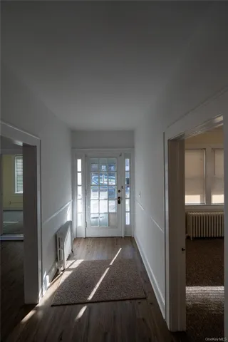 a kitchen with refrigerator and cabinets