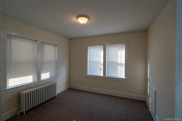 a bathroom with a sink a toilet and a shower