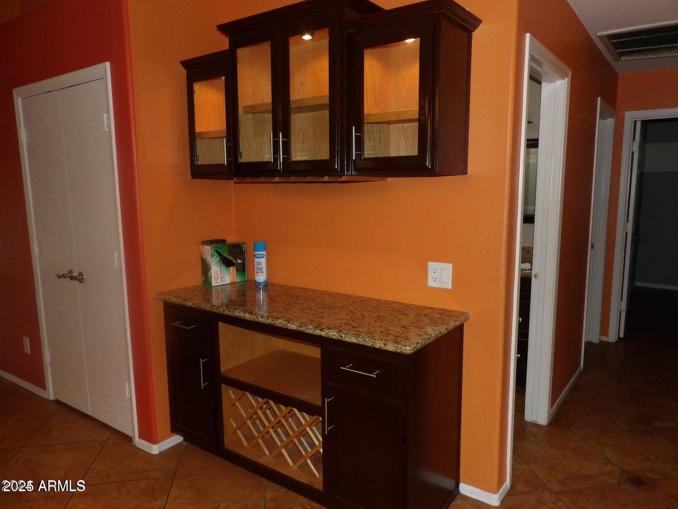 8221 West Papago Street Phoenix, AZ 85043 - Photo 11 of 20 a kitchen with stainless steel appliances granite countertop a refrigerator and a sink