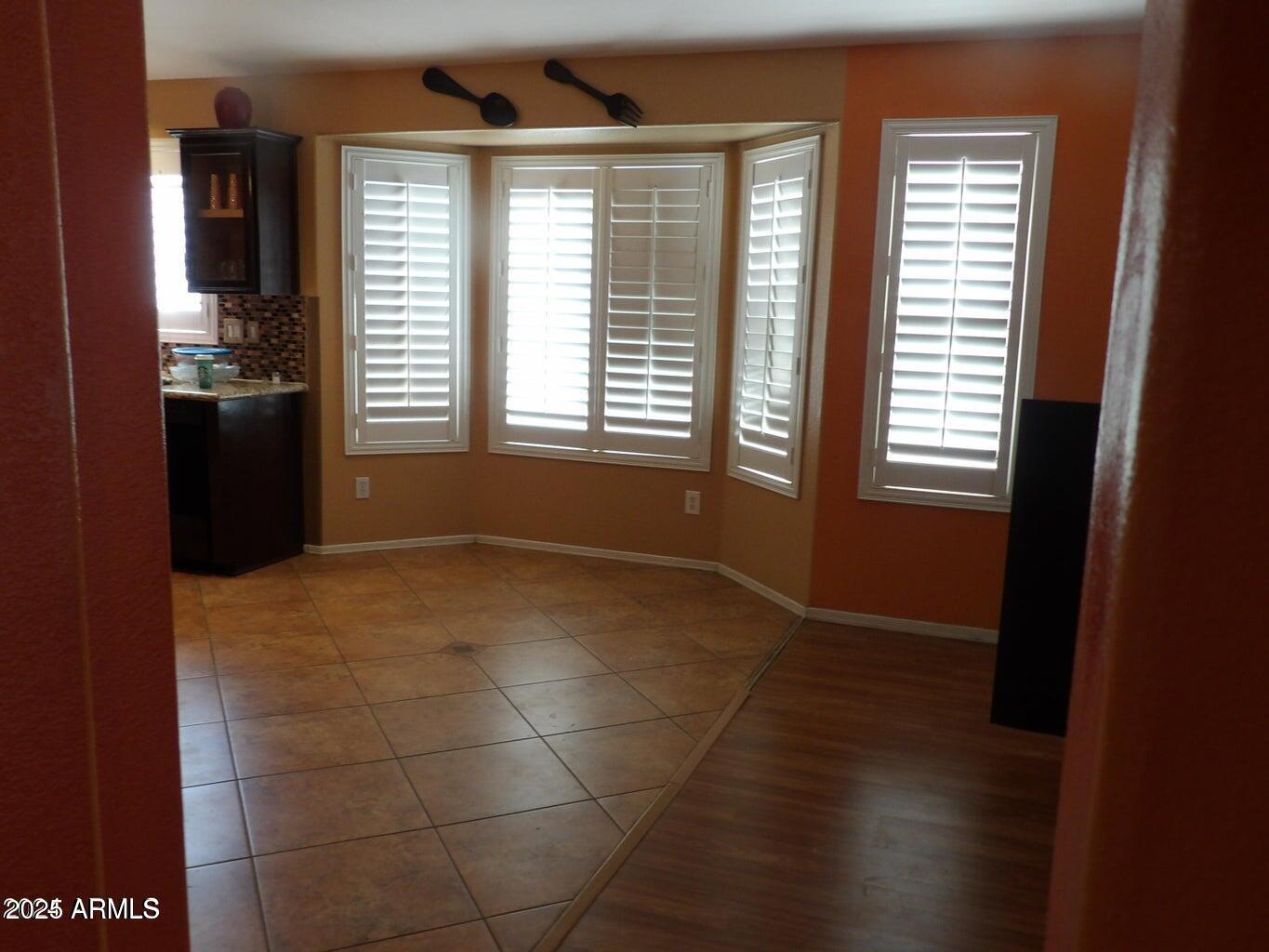 8221 West Papago Street Phoenix, AZ 85043 - Photo 14 of 20 a view of an empty room with a window