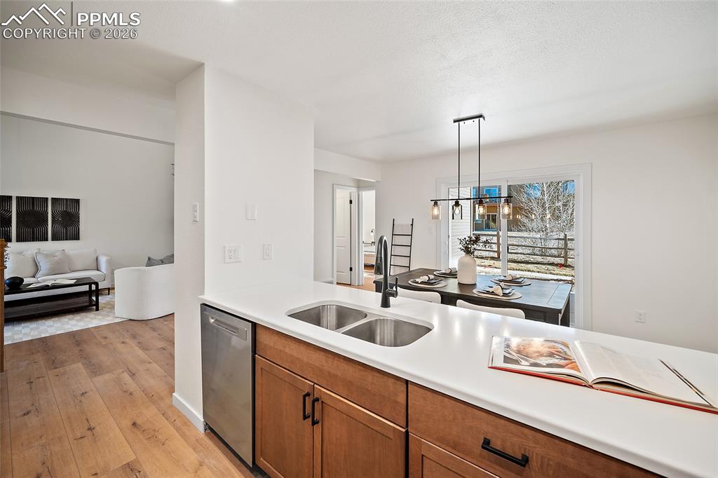 62 Rising Sun Terrace Colorado Springs, CO 80921 - Photo 15 of 46 a kitchen with a sink and cabinets