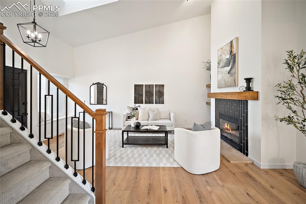 62 Rising Sun Terrace Colorado Springs, CO 80921 - Photo 16 of 46 a living room with furniture and a fireplace