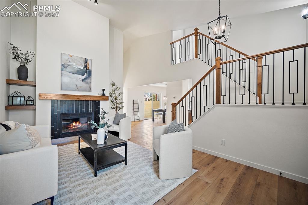 62 Rising Sun Terrace Colorado Springs, CO 80921 - Photo 2 of 46 a living room with furniture and a fireplace