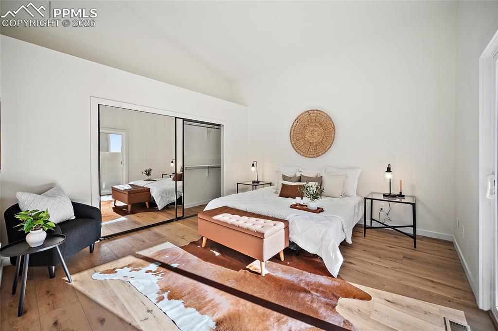 62 Rising Sun Terrace Colorado Springs, CO 80921 - Photo 4 of 46 a living room with furniture and a wooden floor