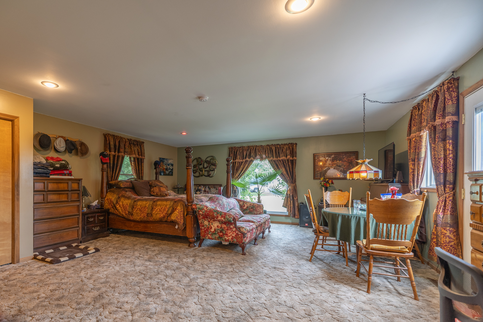 15534 Somonauk Road DeKalb, IL 60115 - Photo 12 of 48 a living room with furniture and a flat screen tv