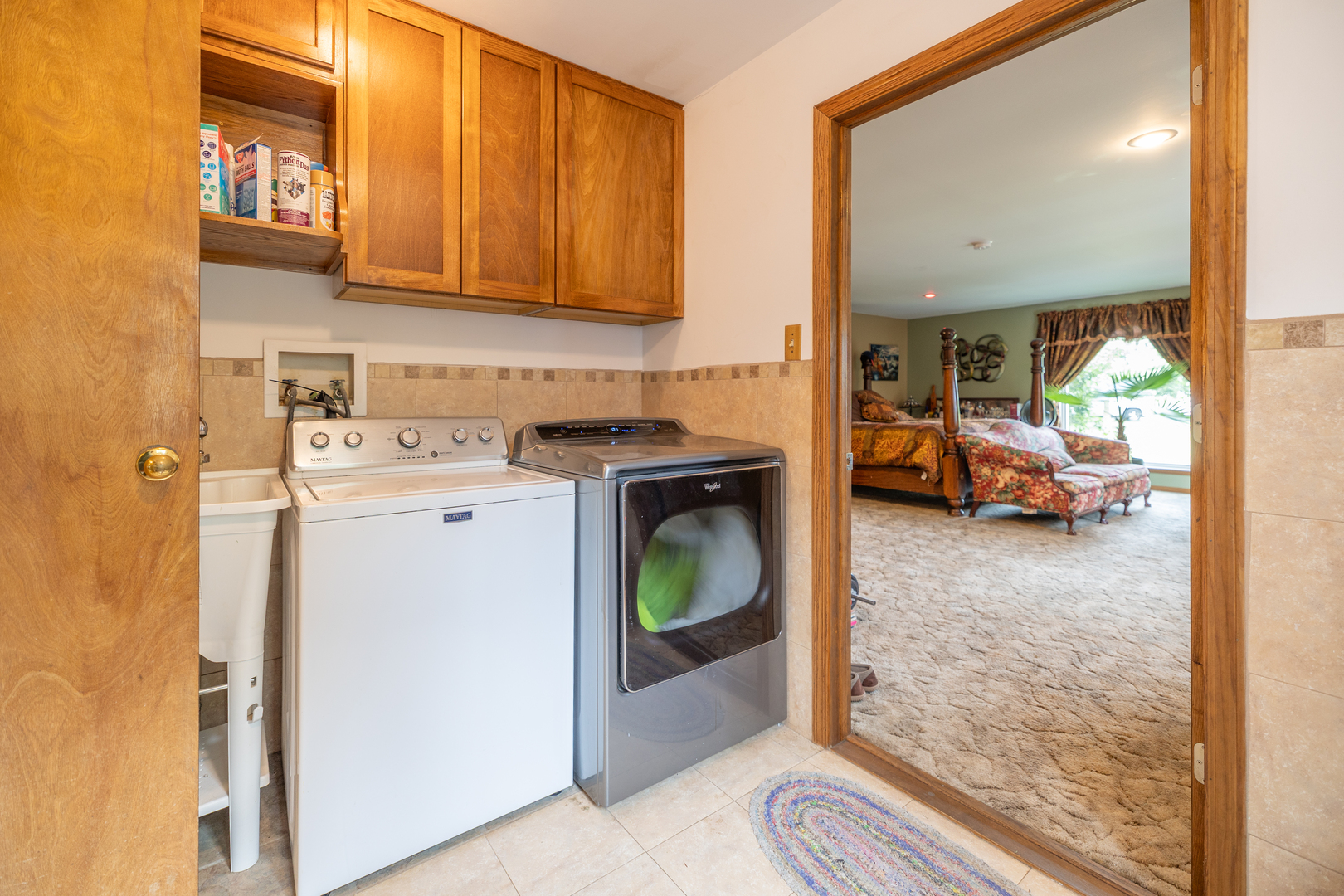 15534 Somonauk Road DeKalb, IL 60115 - Photo 16 of 48 a view of living room washer and dryer