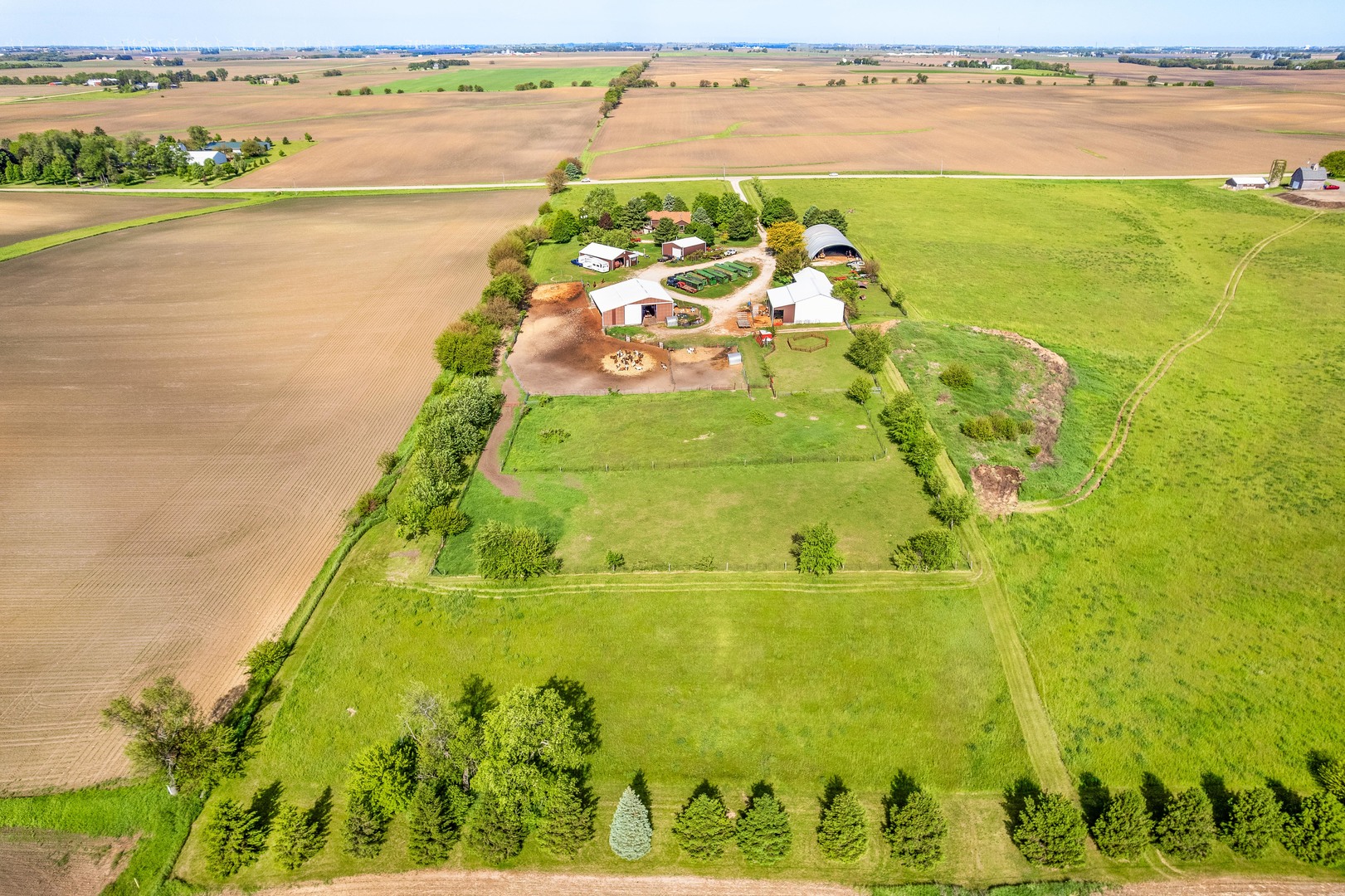 15534 Somonauk Road DeKalb, IL 60115 - Photo 31 of 48 a large body of water with a building in the background